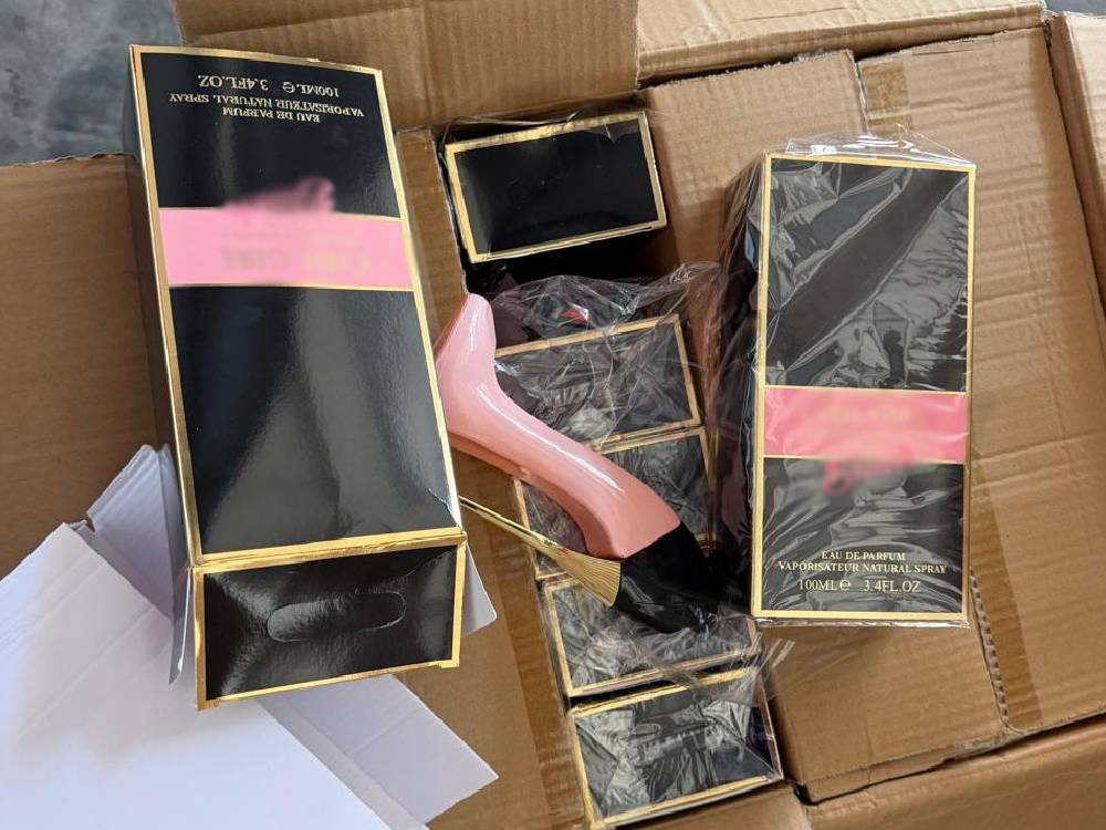 SAT localizó más de 11 mil frascos de perfume sin permiso de importación en Puerto Quetzal